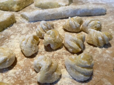 then gently roll into a crescent shape then gently roll gnocchi into a crescent shape